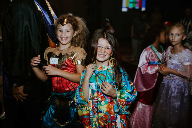 elementary school students wearing costumes